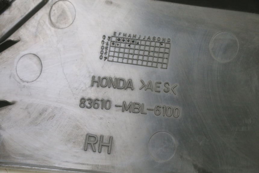photo de RIGHT UNDERSEAT PANEL HONDA NTV DEAUVILLE 650 (2001 - 2006)