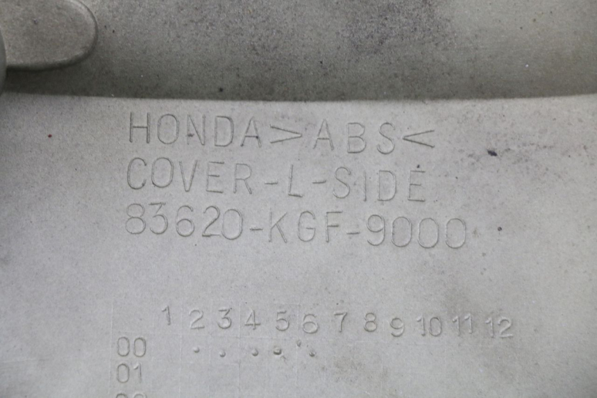 photo de LEFT UNDERSEAT PANEL HONDA NES AROBASE 125 (2000 - 2003)