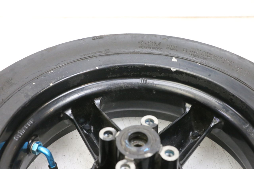 photo de FRONT RIM AND TIRE MBK BOOSTER SPIRIT 50 (2004 - 2017) - Technical close-up