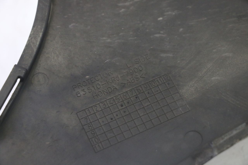 photo de LEFT FOOTREST JOINT HONDA FES S-WING SWING ABS 125 (2007 - 2015)