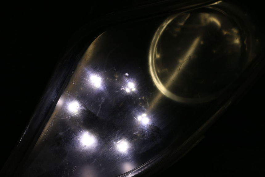 photo de RIGHT FRONT HEADLIGHT KYMCO DINK STREET 125 (2009 - 2014)