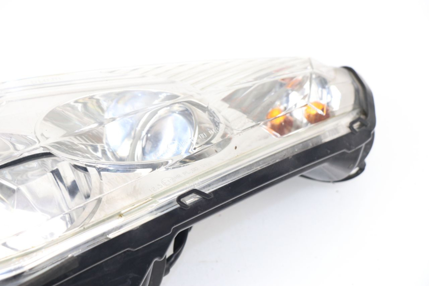 photo de LEFT FRONT HEADLIGHT PEUGEOT SATELIS 125 (2006 - 2009)