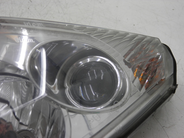 photo de LEFT FRONT HEADLIGHT PEUGEOT SATELIS 125 (2006 - 2009)