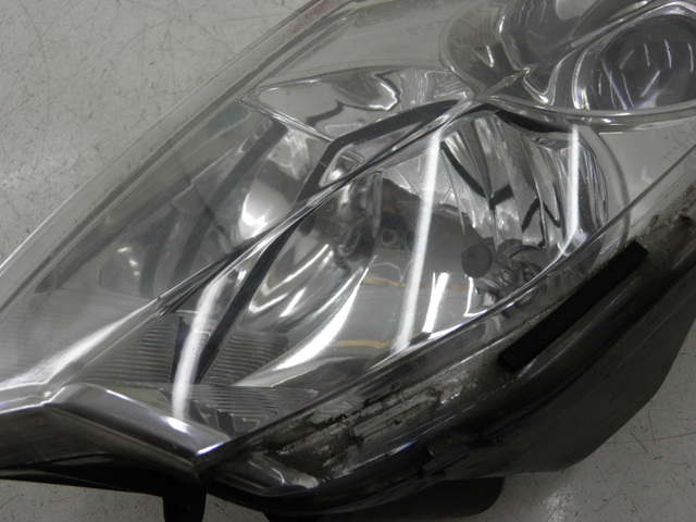 photo de LEFT FRONT HEADLIGHT PEUGEOT SATELIS 125 (2006 - 2009)