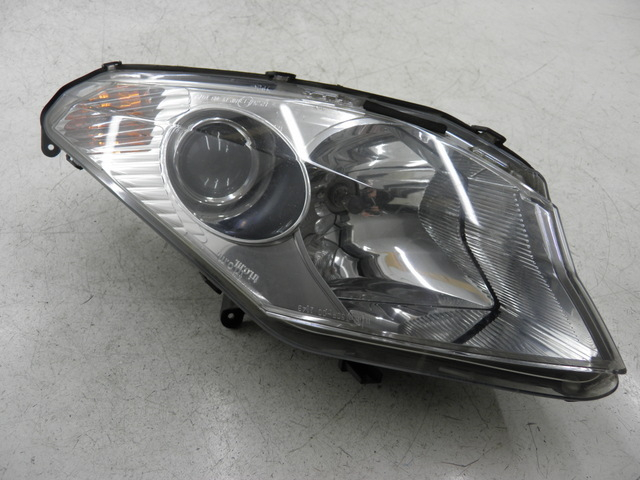 photo de LEFT FRONT HEADLIGHT PEUGEOT SATELIS 125 (2006 - 2009)