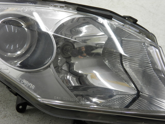 photo de LEFT FRONT HEADLIGHT PEUGEOT SATELIS 125 (2006 - 2009)