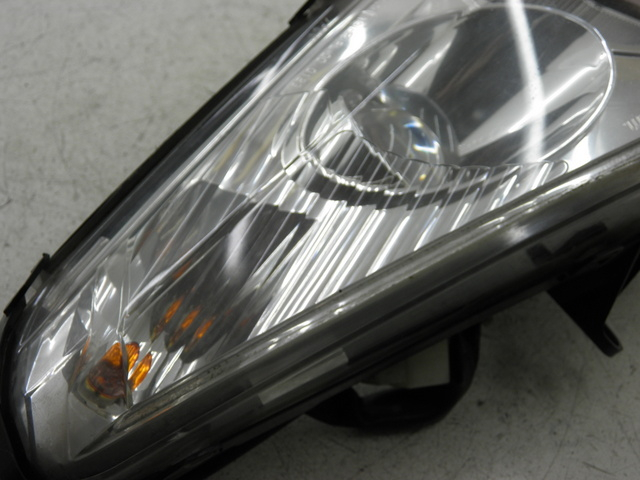 photo de LEFT FRONT HEADLIGHT PEUGEOT SATELIS 125 (2006 - 2009)