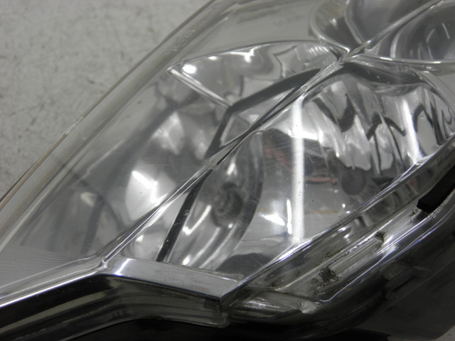 photo de LEFT FRONT HEADLIGHT PEUGEOT SATELIS 125 (2006 - 2009)