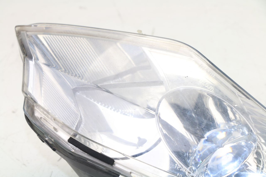 photo de LEFT HEADLIGHT PEUGEOT SATELIS 125 (2010 - 2012)