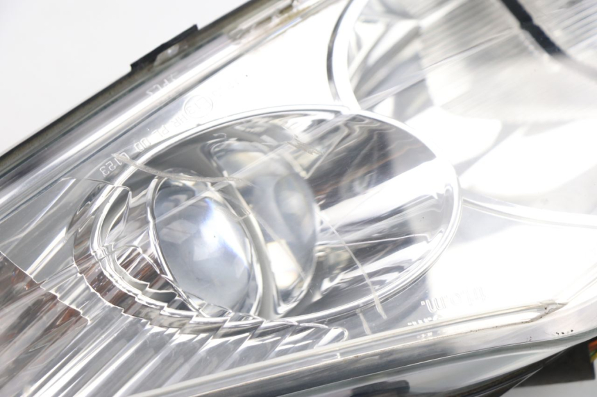 photo de LEFT FRONT HEADLIGHT PEUGEOT SATELIS 125 (2006 - 2009)